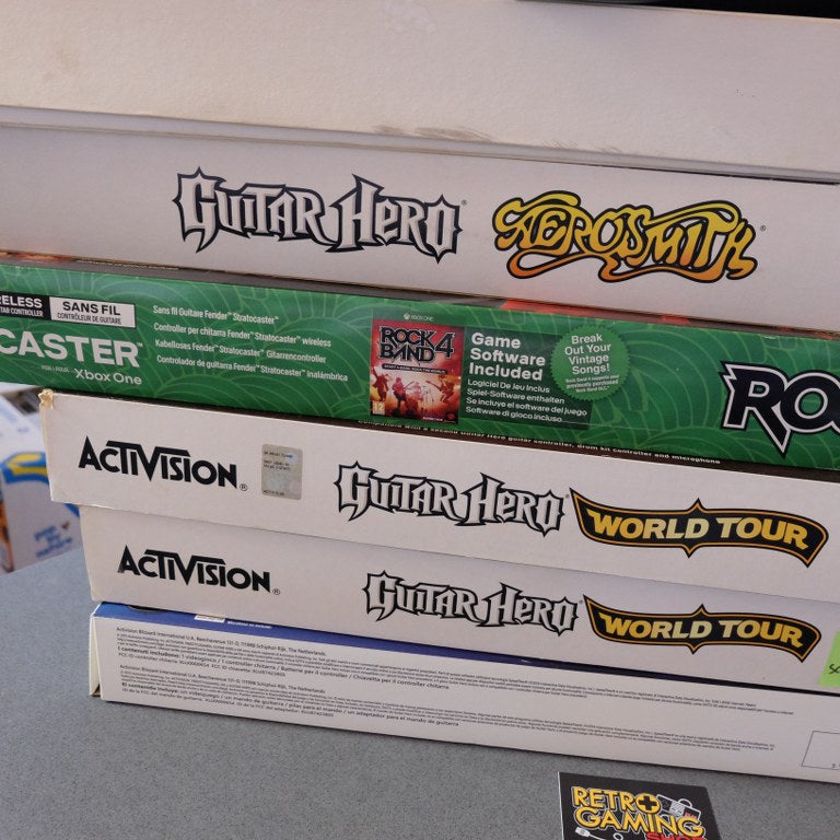 Blocco Giochi Guitar Hero/Rockband Microsoft