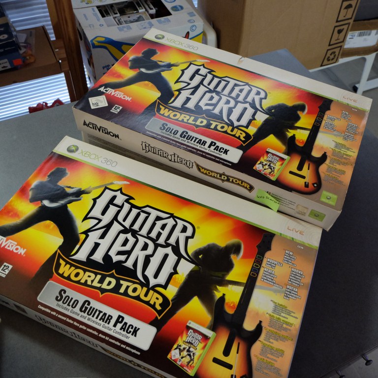 Blocco Giochi Guitar Hero/Rockband Microsoft