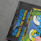 Vendita The Smurfs Travel The World - Retrogaming Shop